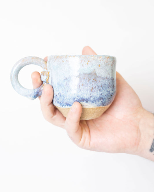 The Tea Cup in Rain