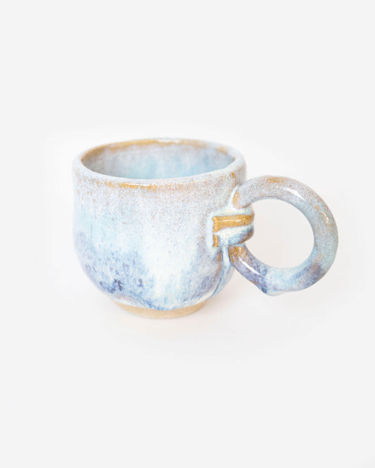 The Tea Cup in Rain